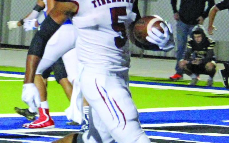 Sentinel photo/Jessica Shepard Tidehaven running back Joseph Dodds (5) strides into the end zone on of his three touchdowns against Rogers. Dodds ran for 139 yards.
