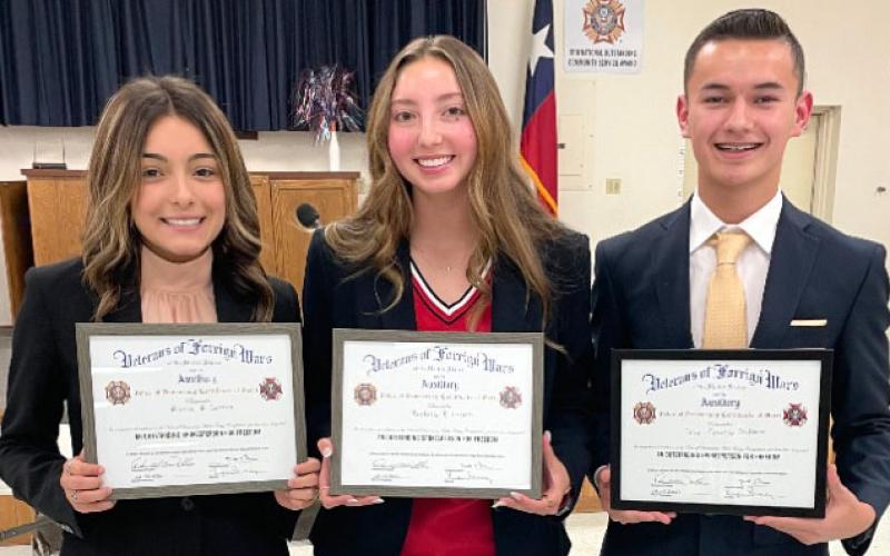 Bay City High School students swept the top three spots in the recent Veterans of Foreign Wars' "Voice of Democracy" contest. The contest, sponsored by VFW post 2438. This year's topic was "America: Where Do We Go From Here?" Alyssa Castro took first place, with Rachelle Larson and Troy Gilbert coming in second and third. Each student performed their speech at a banquet held Tuesday night at the VFW post.  Shown, from left, are Castro, Larson, Gilbert.  Courtesy photo