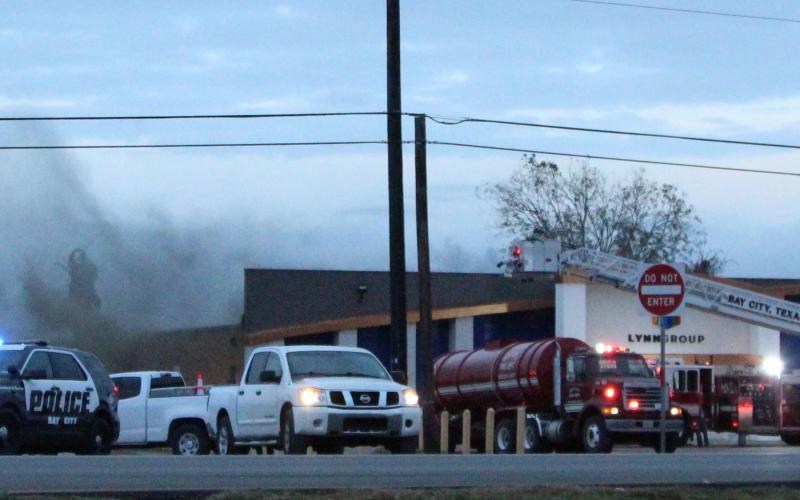 Photo/Anna Hernandez Area firefighters battle a fire that damaged the LynnGroup’s building on Texas 35 West, Wednesday evening, Nov. 24. The LynnGroup was ready to move into its new offices at the former Bowlera Fun Center after several months of renovation. The cause of the fire is still under investigation. Units responding included Bay City, Markham, Van Vleck and Midfield volunteer fire departments.