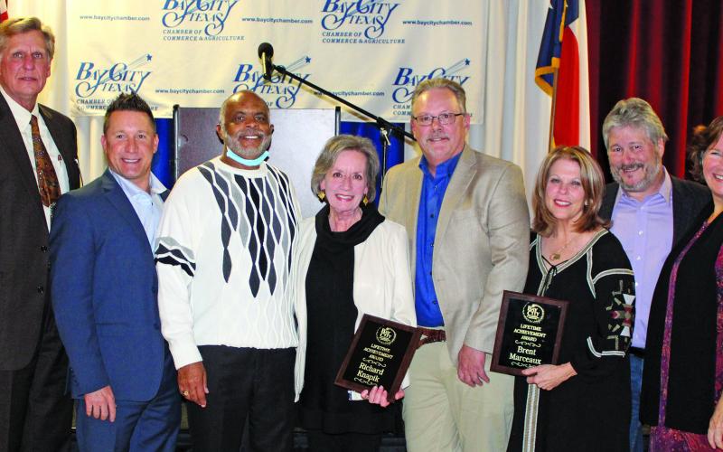 Above, County Judge Nate McDonald, Mayor Pro Tem Jason Childers, Mayor Robert Nelson, Nancy Knapik, Joe Enoch, Kim Marceaux, Councilman Jim Folse and Council Member Becca Sitz.