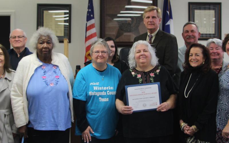 Sentinel photo/Mike Reddell Members of the Matagorda County Historical Commission joined Matagorda County Commissioners Court members Monday, Jan. 24, when the court presented the Distinguished Service Award to MCHC for its dedication and hard work during the 2020 year of service.