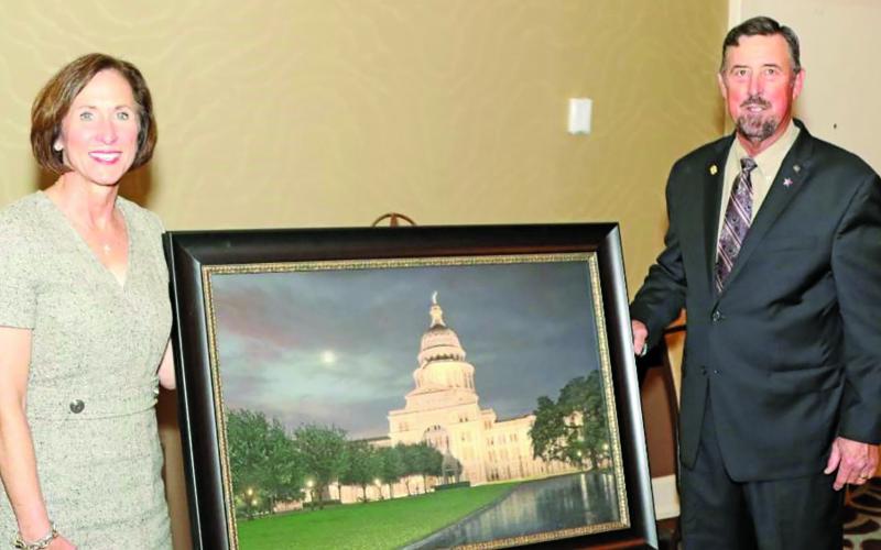 Contributed photo Senator Kolkhorst is presented the S.M. True Agricultural Champion Award from TFB President Russell Boening