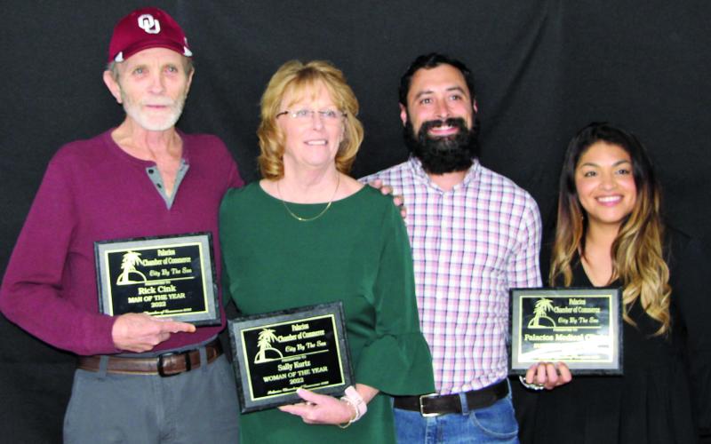 Sentinel photo/MaLinda Reddell Palacios Chamber of Commerce banquet honorees Feb. 17 were, from left, Rick Cink, Man of the Year; Sally Kurtz, Woman of the Year; and Palacios Medical Center, Business of the year.