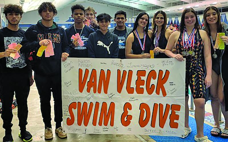 Photo by Van Vleck Swim Coach Ingrid Ryman Van Vleck Swim Team members show off the honors taken at the Region VII-5A swim meet in Victoria.