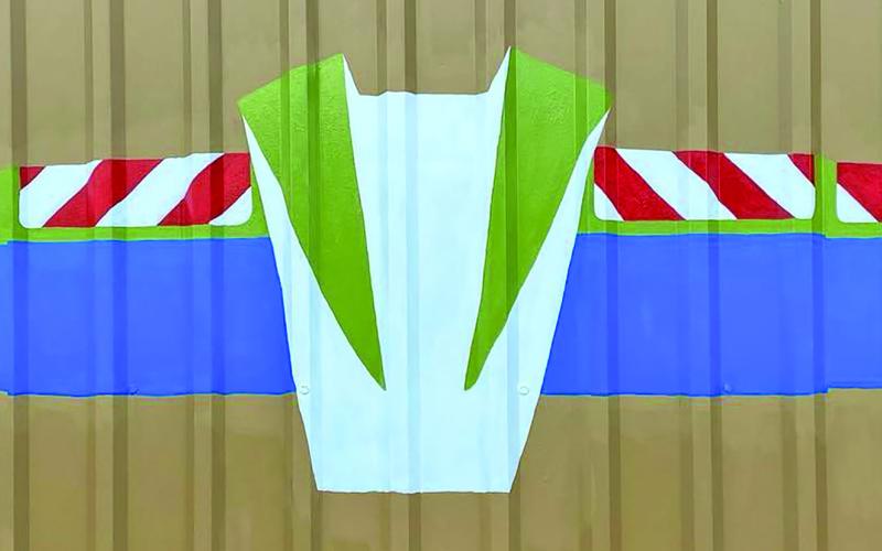 Photo/Zeinab Ghais Zeinab Ghais’ wings were painted at the Bay City Regional Airport. They incorporated their logo and “Buzz Light Year” inspired wings. Since they are always promoting events for children, the airport felt this was a great addition to their space, said Ghais.
