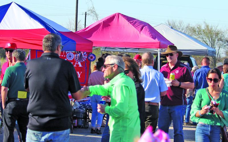 Sentinel photo/Mike Reddell The 12th Annual Great Steak Cook-Off Saturday drew impressive crowds for an early bout of warm weather and a chance to socialize.