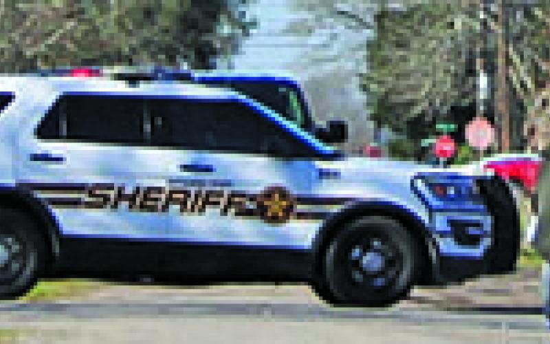 Sentinel photo/Jessica Shepard A Sheriff’s Department cruiser position on Second Street in Van Vleck Wednesday, March 23, as a search warrant ran by the DPS Tactical team looked for possible evidence in reference to the homicide that occurred in that area.