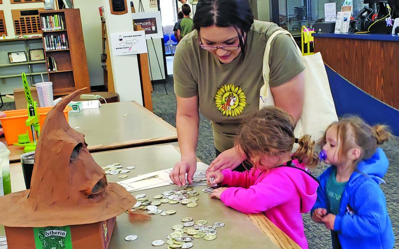 Sentinel photo/Jessica Shepard It was Harry Potter Day at Bay City Public Library Friday, March 18. Several activities were wrapped around the popular fantasy books and movies.