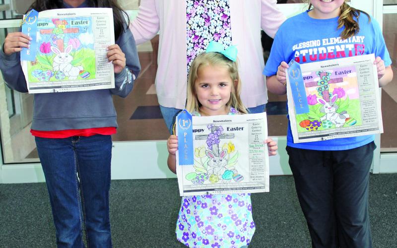 Sentinel photo/Jessica Shepard Contest winners with Blessings Elementary Principal Merideth Dodd: Jade Velazquez, Kate Bartek and Addison Dodd.