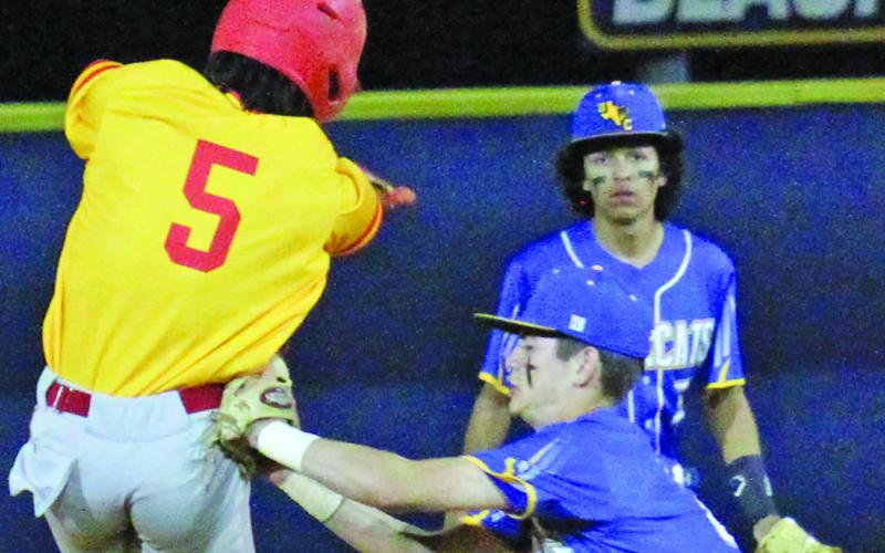 Blackcat Keaton Nunez seals an out after a Stafford player got caught in a rundown between third and second in last week’s district game with the Spartans. Stafford won the April 19 game 4-1 over the Blackcats. Bay City is 3-14-1 on the season and 1-9 in district play, putting them in sixth place. Anna Hernandez photo