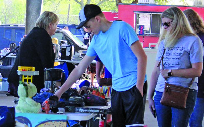 Left and right; Local vendors showed off their wares to an eager bunch of shoppers this past saturday, April 9.  at Bay City Parks and Recreations’s “Junk and Disorderly event. Sentinel photo/Jessica Shepard