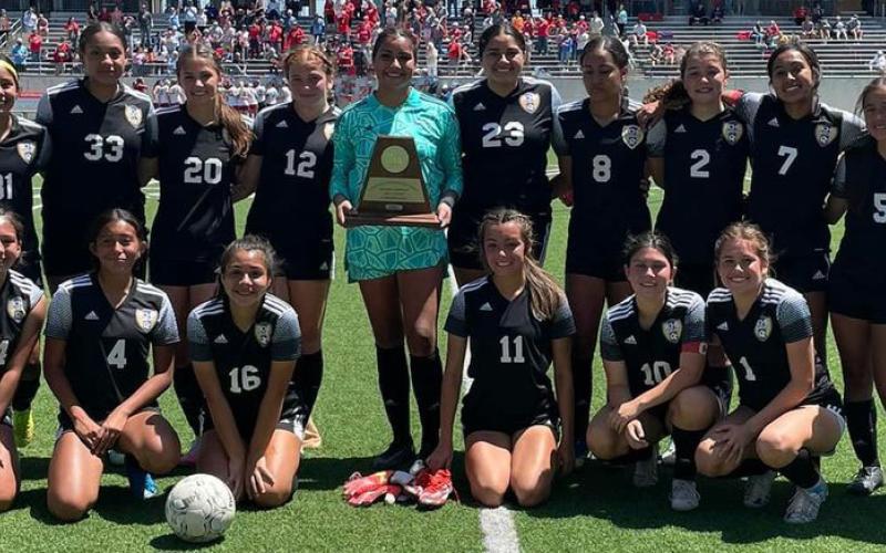 Photo/Anna Hernandez The BCHS Ladycat Soccer team displays their regional runner-up trophy for girls soccer conference this past Saturday, April 9th. The team finished the 21-22 season with 29 consecutive district wins.