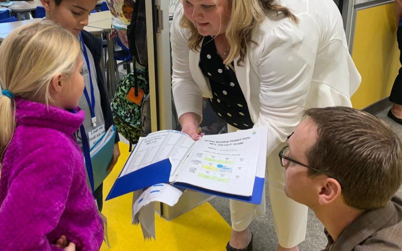 Contributed photo TEA Commissioner Mike Morath listened to students at Linnie Roberts Elementary students with Principal Marissa Wendel in BCISD photo below. Morath visited students and staff at both districts last week.