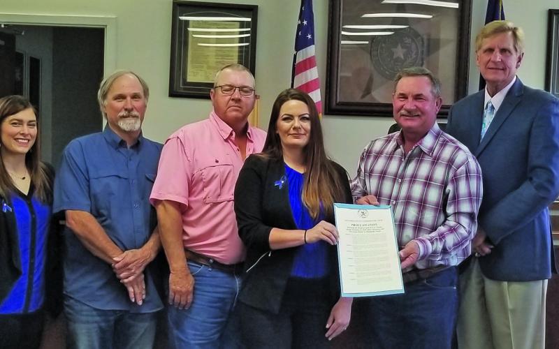 Sentinel photo/Mike Reddell Matagorda County Commissioners Court declared the month of April as Sexual Assault Awareness &amp; Child Abuse Awareness and Prevention Month at the court’s meeting Monday. Shown, from left, are: Chris Hadash and Brittany Matthews, both with The Crisis Center, Precinct 1 Commissioner Bubba Cook, Precinct 4 Bubba Frick, Kelli Wright Nelson, with The Crisis Center, Precinct 3 Commissioner Troy Shimek, County Judge Nate McDonald, and Precinct 2 Commissioner Kent Pollard.