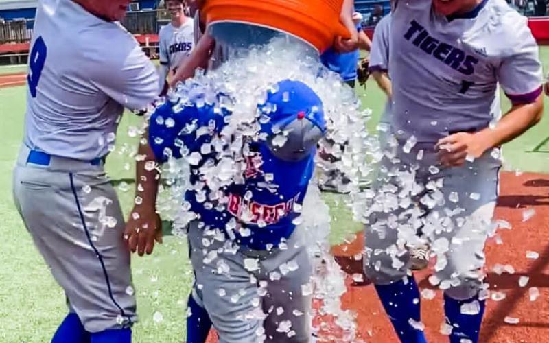 Courtesy photo Coach Eddie Russell gets iced down after the win.
