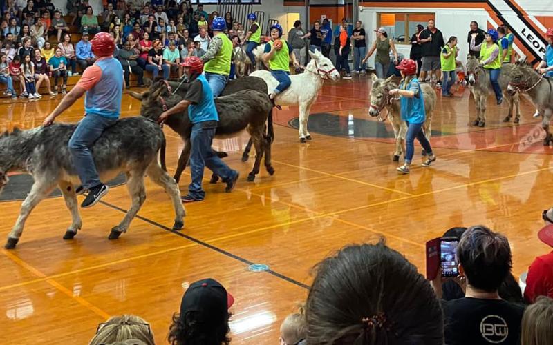 Courtesy photo from Kelsie Brown Teams take the court for the Donkey Basketball game April 21. The Van Vleck High School Cheerleader Booster Club’s four-team fundraiser drew 500 spectators of all ages. Booster Club President Kelsie Brown plans on bringing the fundraiser back next year.