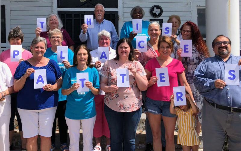 Contributed photo Matagorda County Historical Commission members pictured on the front steps of Palacios’ Luther Hotel show that they believe “This Place Matters.”