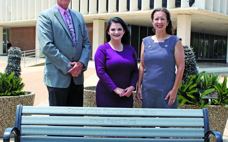 Sentinel photo/Jessica Shepard Matagorda County Judge Nate Mcdonald joins Bay City Main Street Program Manager Tina Israel and Bay City Community Development Executive Director Jessica Russell in the arrival of new benches for the corners of the courthouse plaza, Monday, May 9.