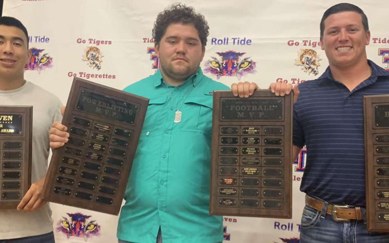 Courtesy photo Tidehaven High School recently honored MVPs at its recent sports banquet. Among the honorees were, from left: Jose Martinez, Boys TJ Foster Fighting Heart Award; Jerry Johnson, Powerlifting MVP and co-MVP in Football; Logan Crow, Baseball MVP, and co-MVP in Football.