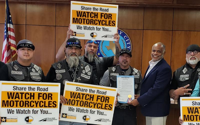 Sentinel photo/Jessica Shepard Calaveras Motorcycle Club members received Bay City Mayor Robert Nelson's proclamation identifying the month of May as "Motorcycle Safety and Awareness Month" Tuesday, May 24. The proclamation urges all citizens to "become aware of the inherent danger involved in operating a motorcycle, and for riders and motorists alike to give each other the mutual respect they deserve."