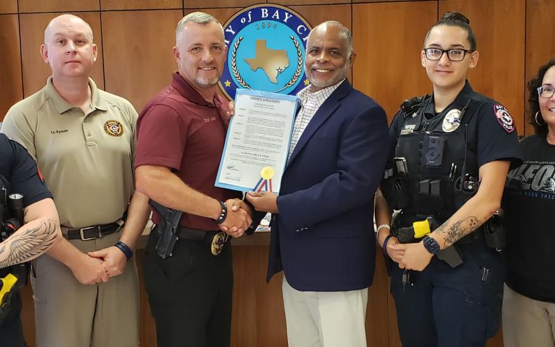 Sentinel photo/Jessica Shepard Bay City Mayor Robert Nelson proclaimed May 15-21 as "National Police Week" during the Tuesday, May 24 city council meeting. The proclamation encourages citizens to express "gratitude for the dedicated service and courageous deeds of our City of Bay City Police Department officers and for the contributions they have made to the security and wellbeing of our community."