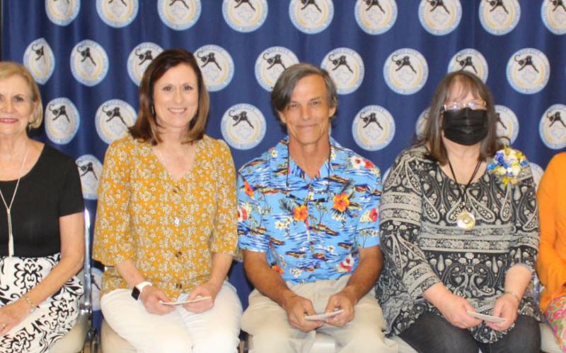 Sentinel photo/Jessica Shepard Bay City ISD employees were recognized for their retirement at the annual employee banquet Thursday, May 19. Those employees are Martha Johnson, Lisa Stuhler, Daniel Tinus, Leslie Stevens, and Donnye Stone. Retirees are flanked by BCISD school board President Jill Westmoreland and trustee Priscilla Robinson. Not pictured is retiree Lisa Volkmer.