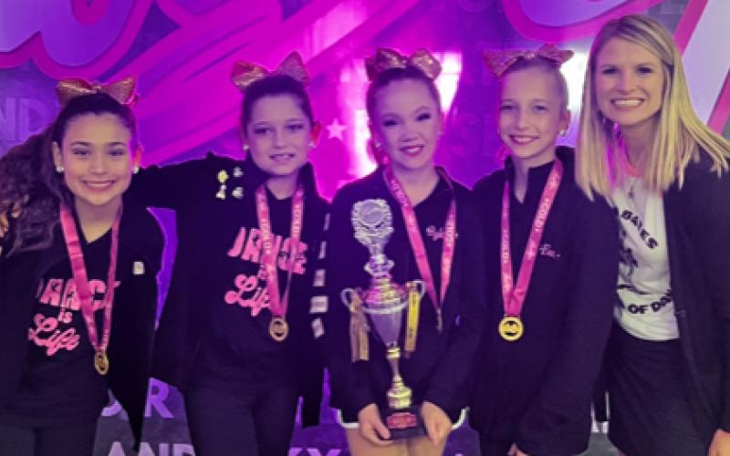 The Jazzettes are, from left, Kenzie Zamora, Mckinley Rocha, Ryleigh Siptak,  Eva Schneider, and Director Sarah Brashear