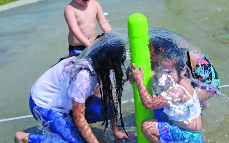Sentinel photo/Mike Reddell There were plenty of ways to capture the interest of children at the Bay City Parks &amp; Recreation Summer Kick-Off at Amistad Park Saturday, June 4. Another big attraction, as always at Amistad, is the Splash Pad. Kids go into a water bubble at one Splash Pad station. The Summer Kick Off also featured crafts, games, Backyard Bass and food trucks.