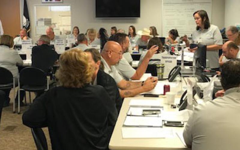 Photo/Mike Estlinbaum Matagorda County Emergency Operation Center people work through an emergency drill July 20 that was graded by NRC and FEMA.