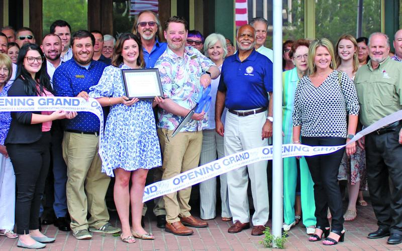 Sentinel photo/Jessica Shepard Fat Grass Restaurant &amp; Bar celebrated its re-opening ribbon cutting Thursday, June 28. The restaurant will now be open for lunchtime Tuesday-Saturday and feature brunch on Saturdays.