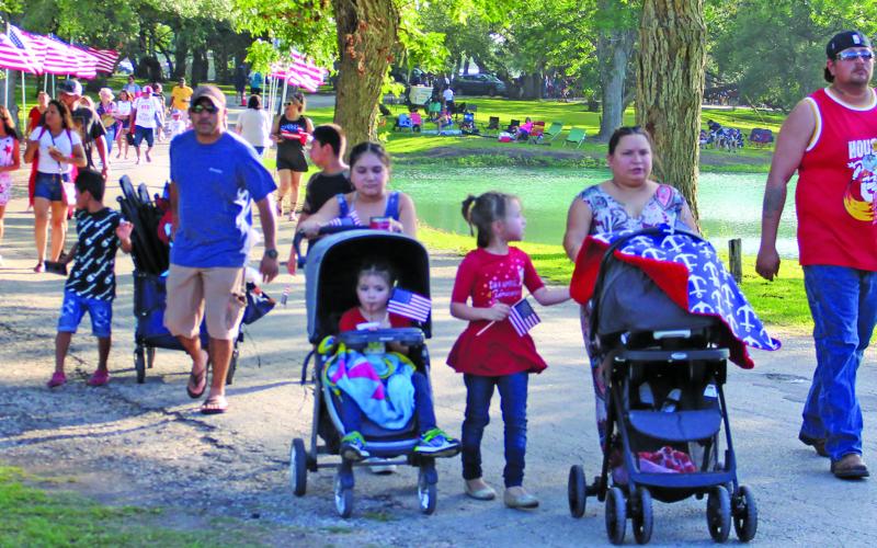 Sentinel photo/Jessica Shepard Crowds of citizens flocked to Le Tulle Park to celebrate Independence Day at the annual Bay City Parks &amp; Recreation Department's "Freedom Fireworks" event, Monday, July 4. There were several food vendors on hand along with musical entertainment, games, and rides that led up to the fireworks finale at 9:30 that night.