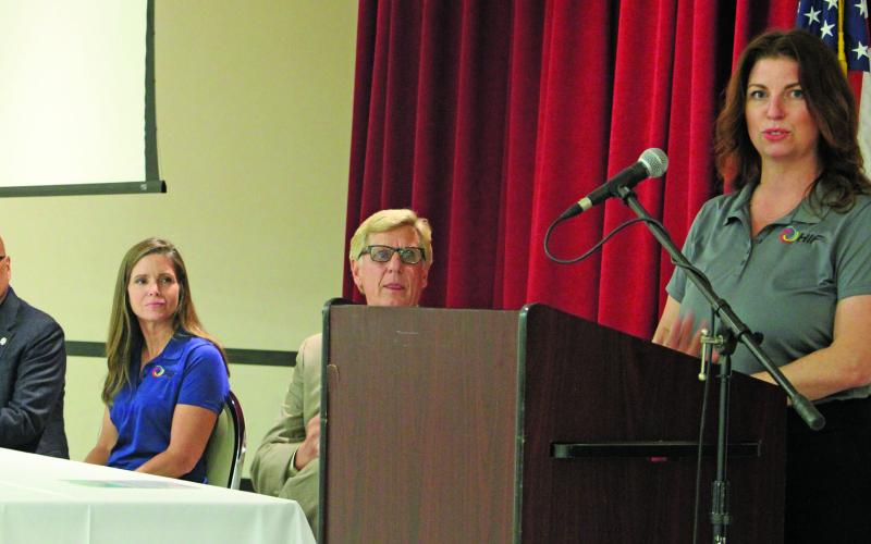 Sentinel photo/Jessica Shepard HIF Chief Operations Officer Brooke Vandygriff, right, presented a PowerPoint informational session on HIF's plans for its Matagorda County eFuels production facility on Aug. 30. Vandygriff explained that the company was concentrating on on-site work at the moment but would pursue beginning construction in 2023.
