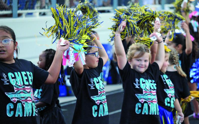 Sentinel photo/Mike Reddell Tenie Holmes Blackcat Cheerleaders support the Bay City team in its victory over Sealy Friday night, Sept. 16.