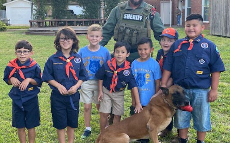 Contributed photo Recently, Cub Scout Pack 4545 had Lt. Phillip Hester with the Matagorda County Sheriff’s Office as a guest speaker to discuss the importance of being aware of their surroundings and safety.  As a special treat, Lt. Hester brought his K9, Maximus.
