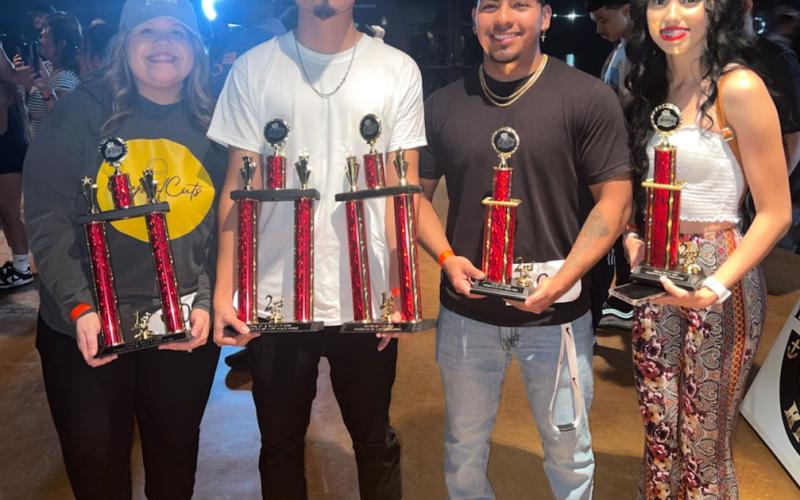 Contributed photo Truth Barbershop stylists placed high in the "B-County Barber Battle" Sunday, Sept. 25. From left: Crystal Charles 1st Place in female barber category; Jose Ramos 1st place in design category and 2nd place in King of B County; Orlando Moreno Jr. 2nd place in fasted fade; and Bertha Carrete 2nd place female category.