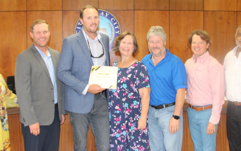 Sentinel Photo/Mike Reddell  City Council recognized Zion Development Group for residential development at its Oct. 11 meeting.