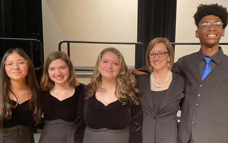 BCISD photo Bay City High School recently hosted the TMEA Region 13 Small school choir region concert, with over 100 students from 13 different schools. BCHS Choir director Dr. Kara Cowart, second from right, is shown with students Kayla Villafuerte, Sydney Hudgins, Alina Rasmussen, and De’maurion LeDay, who will go on to compete at the next round in a couple of weeks.
