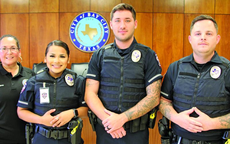 Sentinel Photo/Mike Reddell Bay City Police Chief Christella Rodriguez, left, is shown with three new officers who were recently sworn in. The three are, from left, Ariana Garay, Dillan Wakefield, and Timothy Helton.
