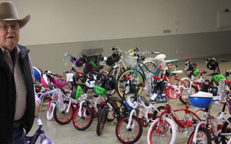 Sentinel Photo/Mike Reddell The Matagorda County Sheriff’s Office gave away 68 bicycles Dec. 22, at the Fairgrounds’ Multi-purpose building. Ace Hardware in Bay City donated the bikes to the sheriff’s office to be given to children who needed them.