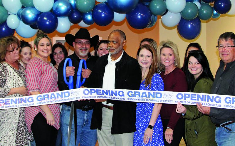 Sentinel photo/Mike Reddell Help, Inc. held its grand opening ribbon cutting Thursday, Jan. 12. The store is located at 2140 Avenue F in Bay City.