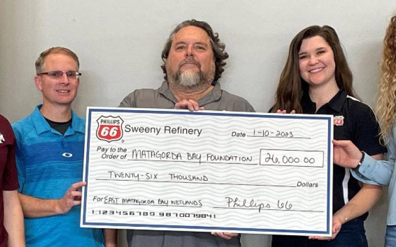 Contributed photo Phillips 66 presents donation to Matagorda Bay Foundation and Texas A&amp;M AgriLife researchers for East Matagorda Bay Wetlands Project on Jan. 11.