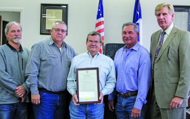 Sentinel Photo/Mike Reddell  Above right, Pollard shows off his resolution, with the court on either side of him.