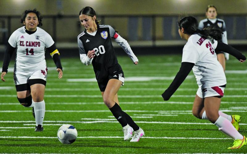 Bay City Lady Cat soccer No. 20 moves the ball in a recent 9-0 victory against El Campo.  Last week, the girls beat Hallettsville 10-0 at home Jan. 30, and Rice, by a like score, there Friday, Feb. 3. The girls were to play Columbus Monday (past the Sentinel’s press time). Going into that game, the Lady Cats were 12-2, 4-0, and first in District 22-4A-1. Courtesy photo