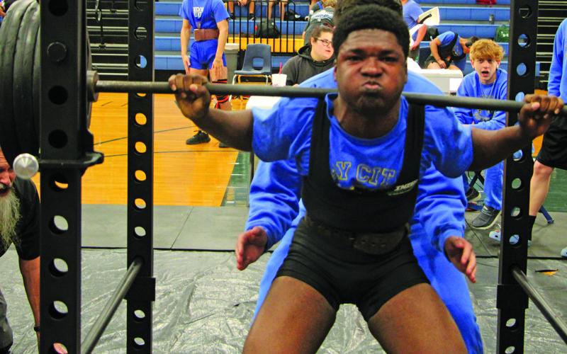 Sentinel Photo/Mike Reddell Bay City powerlifter is Zion Sanders - 165 class - exerts on this lift at the BCHS powerlifting meet Saturday, Feb. 11.