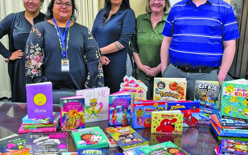 Contributed photo The Pilot Club of Matagorda County recently donated $500 to purchase a variety of new children’s books at the Bay City Public Library.