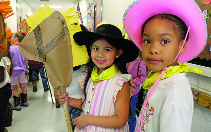 BCISD photo John H Cherry Elementary School rounded up their horses for the rececnt annual Cherry Rodeo. Students performed a line dance to 'Deep in the Heart of Texas.' School officials thanked volunteers who helped make the students' horses and Bay City Junior High Student Council help.