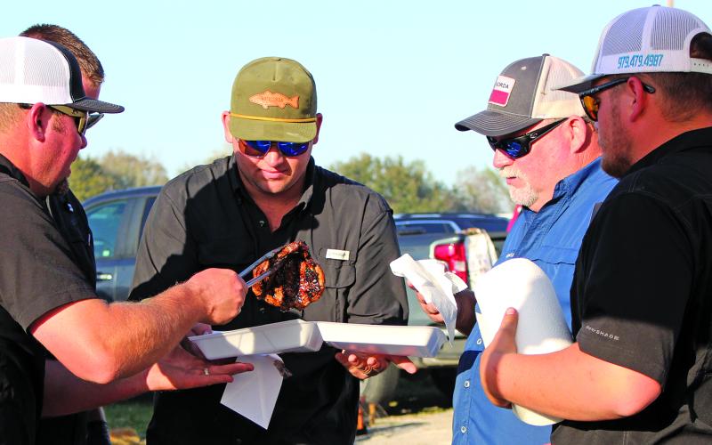 Sentinel file photo A cook-off team examines its steak entry.
