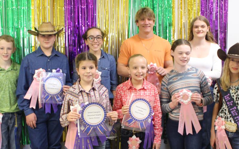 Matagorda County Fair and Livestock Association's home economics food division reserve grand champions earned pink rosettes for winning their chosen divisions Saturday, Feb. 25. Winners include Abigail Jurek, Stephen Carson, Ashely Alford, Clara Dodd, Marley Schneider, Madelyn Botbyl, Raegen Hood, Camille Hutson, Addison Smith, Tayler Martinez, Jace Reynolds, Emma Bonnot, Italia Cruz, Adelynn Tidwell, Ayden Smith, Alex Lawhon, and Audrey Delgado. Sentinel Photo/ Jessica Shepard