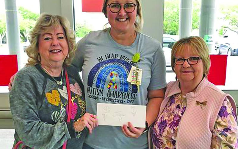 Contributed photo The Pilot Club of Bay City donated $200 to the Tenie Holmes Elementary Sensory Garden. Donations will be used to purchase blueberry bushes, peach trees and tools for fruit gardening experience.