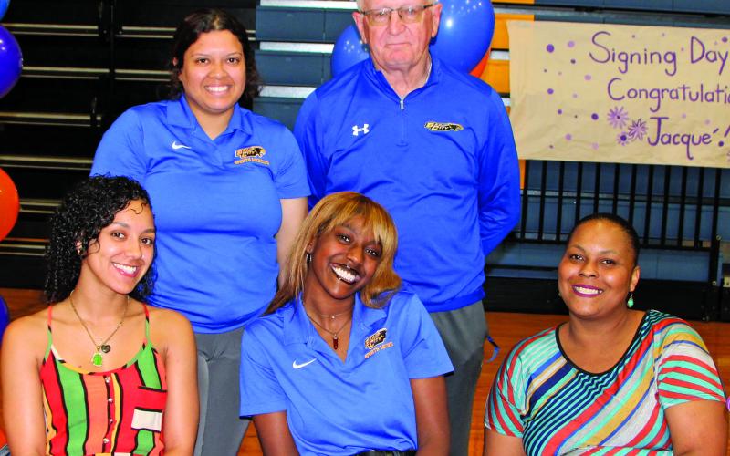 Sentinel photo/Mike Reddell Adonaia Curtis signed a letter of commitment to be a student athletic trainer at Angelina College in Lufkin. The National Honor Society member helped with multiple sports including basketball, baseball, track and football.